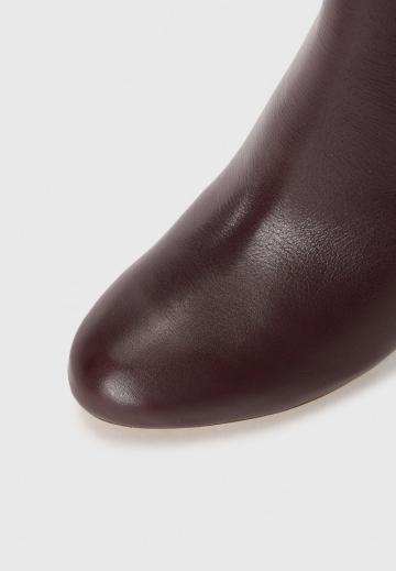 Высокие сапоги