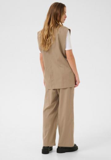 Длинный жилет