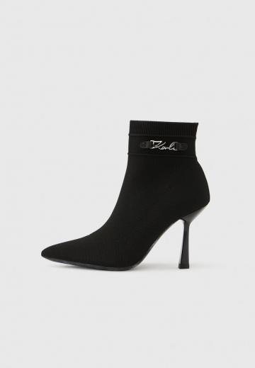 Высокие сапоги