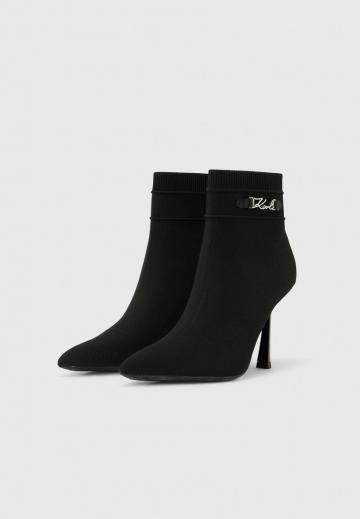 Высокие сапоги