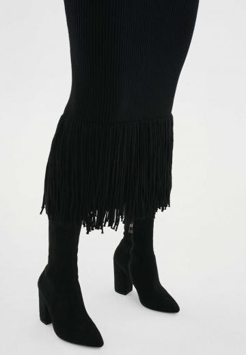 Высокие сапоги