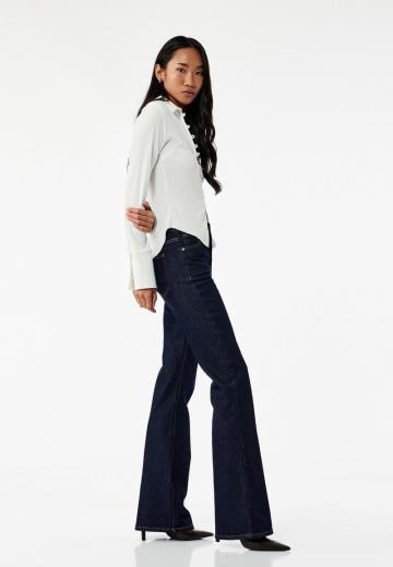 Клешеные джинсы