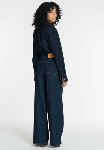 Клешеные джинсы