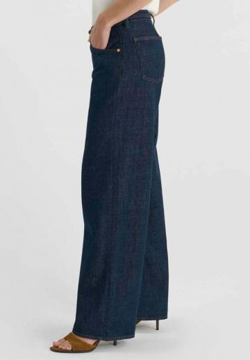 Клешеные джинсы