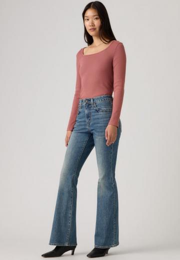 Клешеные джинсы