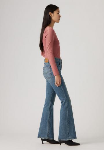 Клешеные джинсы