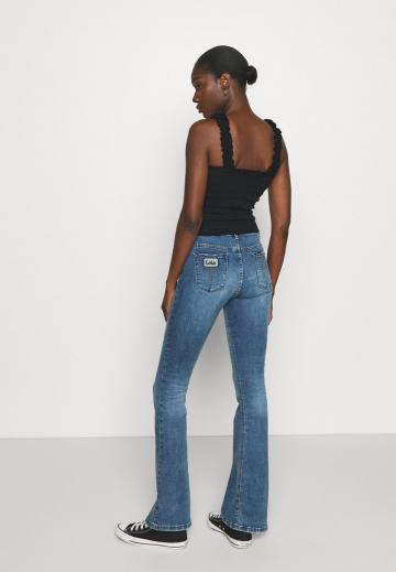 Клешеные джинсы