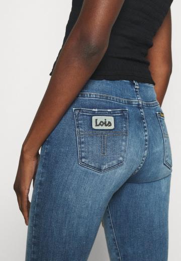 Клешеные джинсы