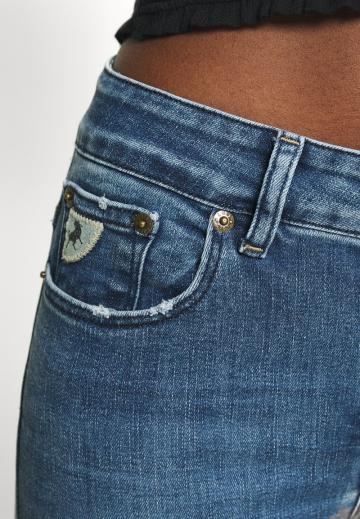 Клешеные джинсы