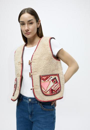 Джинсовая жилетка