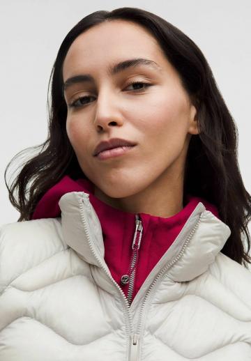 Пуховой жилет