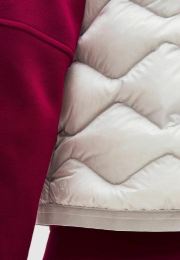 Пуховой жилет