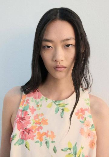 Блузка без рукавов