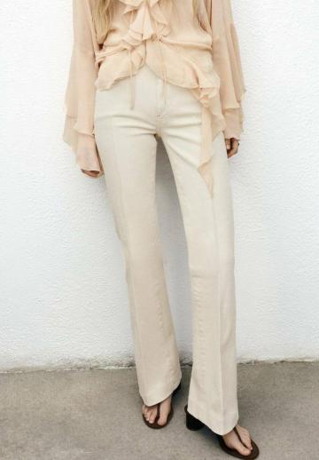 Клешеные джинсы