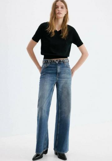 Клешеные джинсы