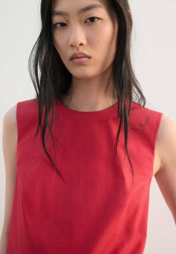 Блузка без рукавов