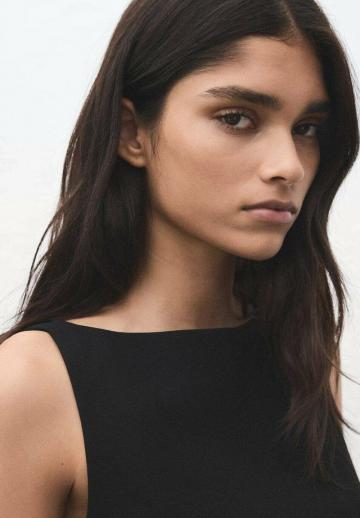 Блузка без рукавов