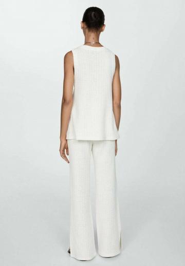 Длинный жилет