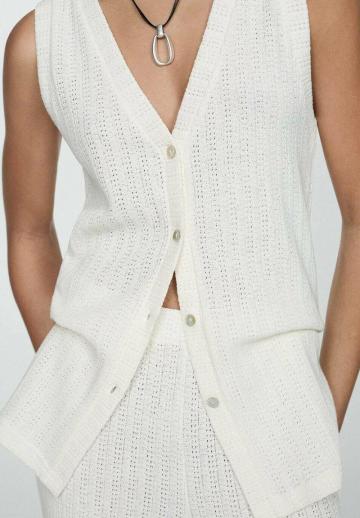Длинный жилет