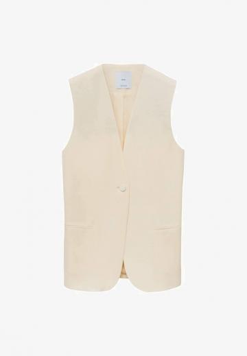 Длинный жилет