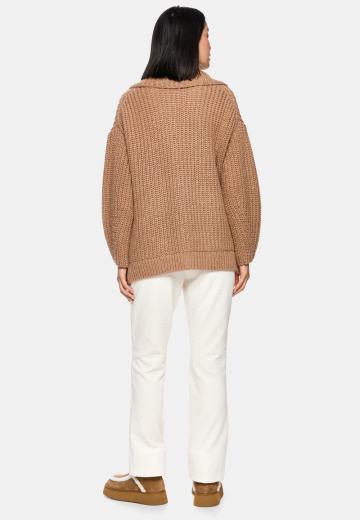 Длинный жилет