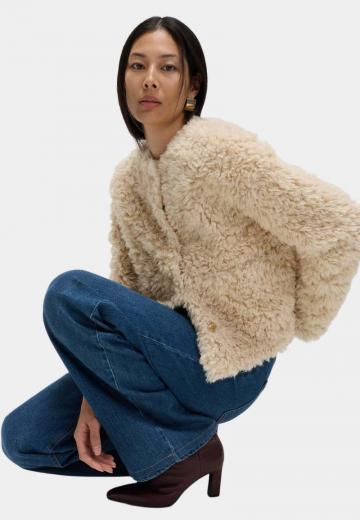 Пуховой жилет