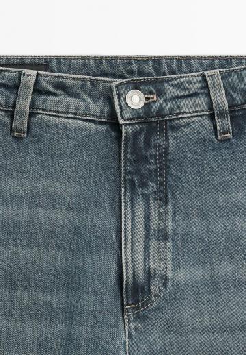 Клешеные джинсы