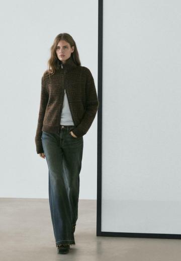 Клешеные джинсы