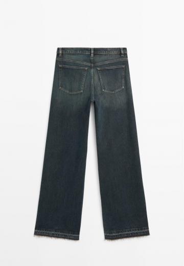 Клешеные джинсы