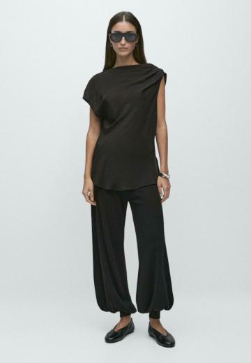 Блузка без рукавов