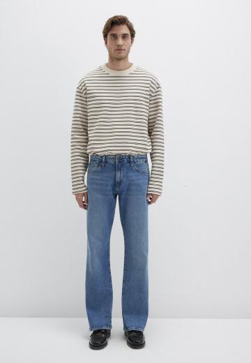 Клешеные джинсы