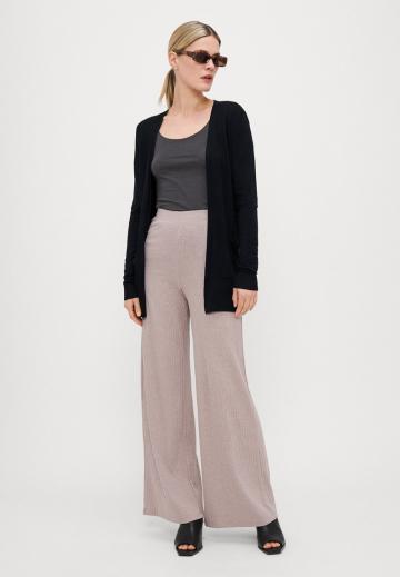 Длинный жилет