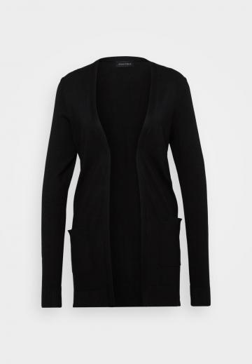 Длинный жилет