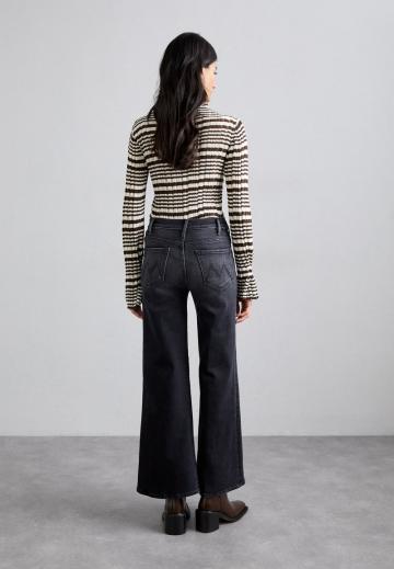 Клешеные джинсы