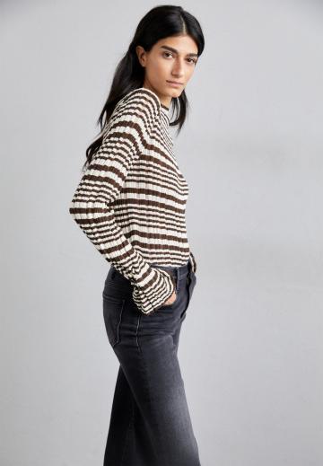 Клешеные джинсы