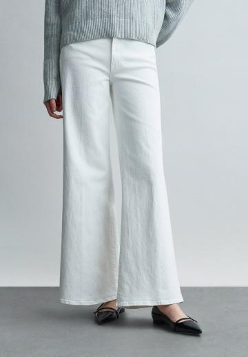 Клешеные джинсы