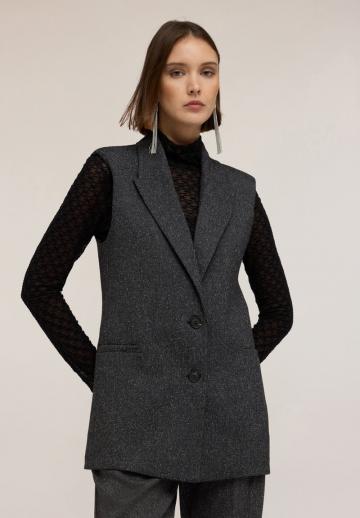 Длинный жилет