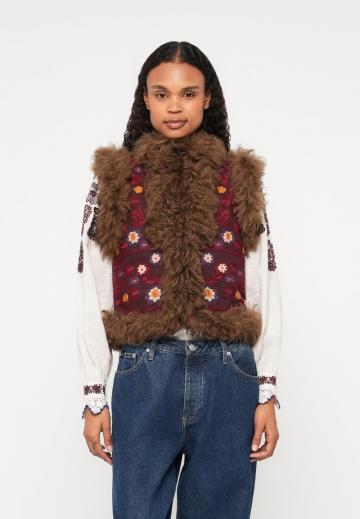 Пуховой жилет