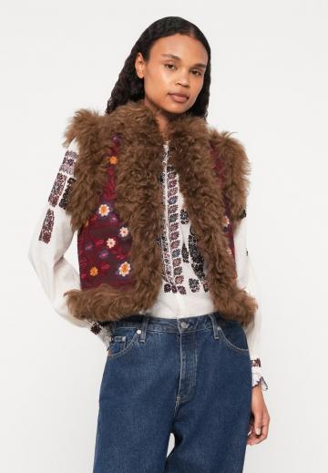 Пуховой жилет