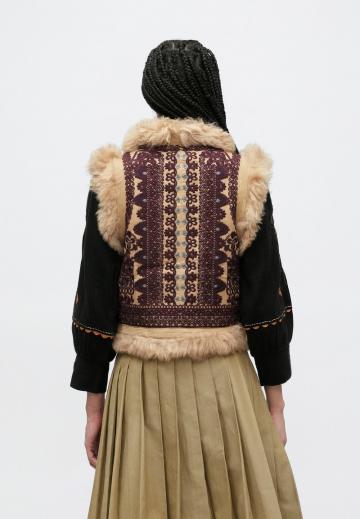 Пуховой жилет