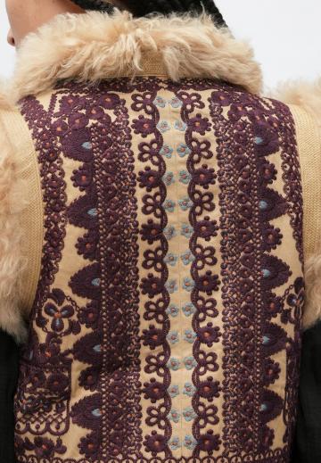 Пуховой жилет