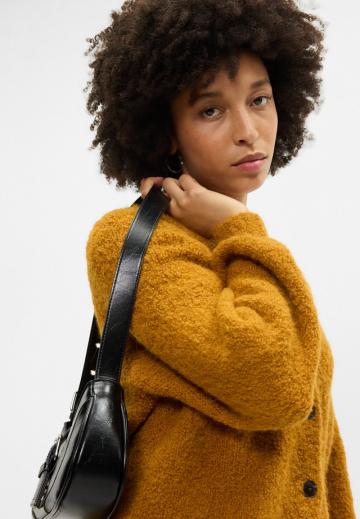 Вязаный жилет