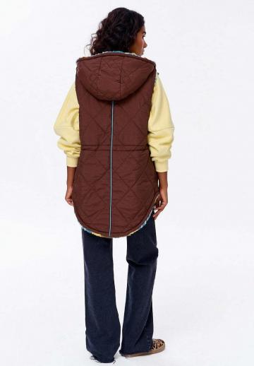 Длинный жилет