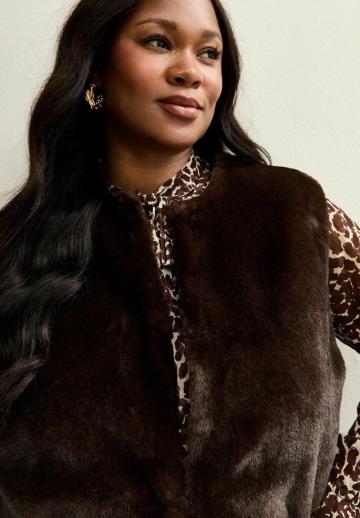 Пуховой жилет