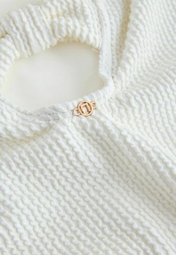 Слитный купальник