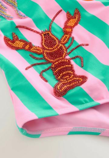 Слитный купальник