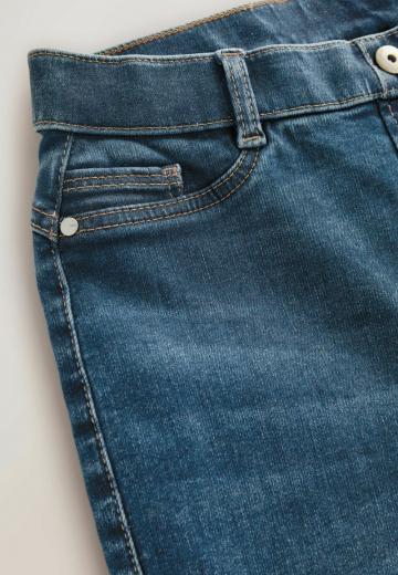 Клешеные джинсы