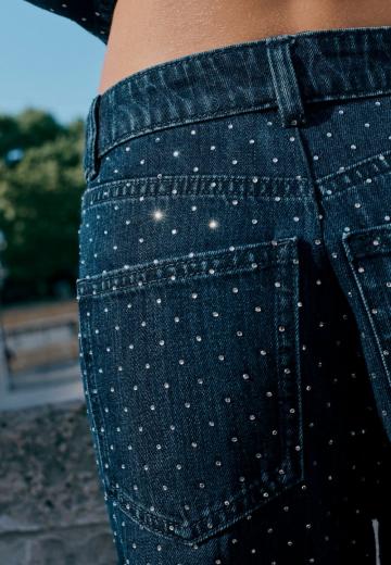 Клешеные джинсы