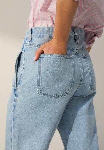 Клешеные джинсы