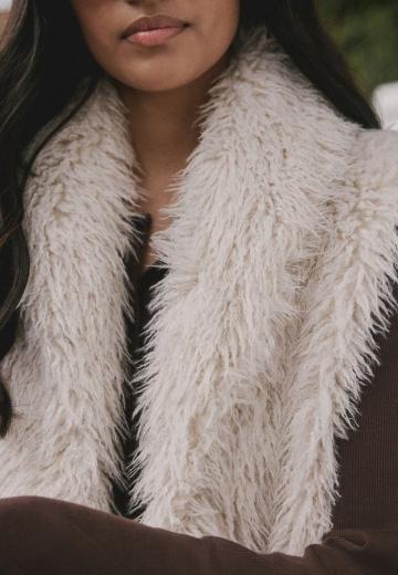 Пуховой жилет